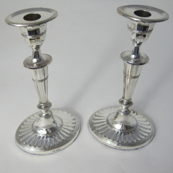 Pair of Silver Candlesticks with Fluted Capitols and Stem on an Oval Reeded and Fluted Base
