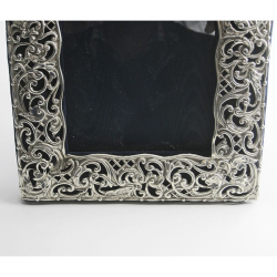 Decorative Edwardian Rectangular Silver Photo Frame with Pierced Scroll and Floral Border